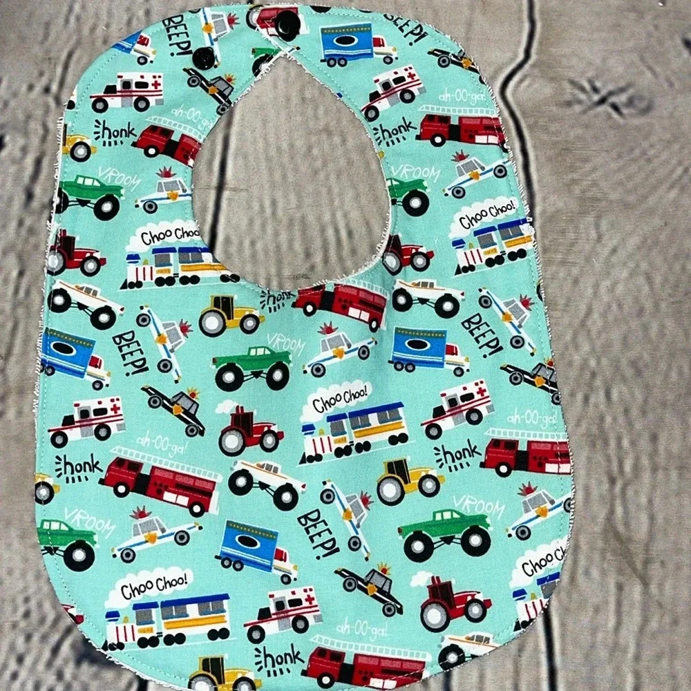 Designer handcrafted transportation bib